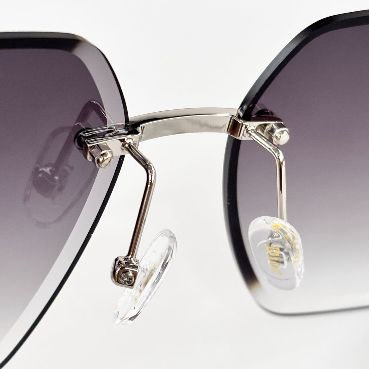 D**R 30Montaigne S6U Rimless Sunglasses | Gold Metal Frame, Brown Gradient Bevelled Lenses, CD Logo Temple | Multiple Colors