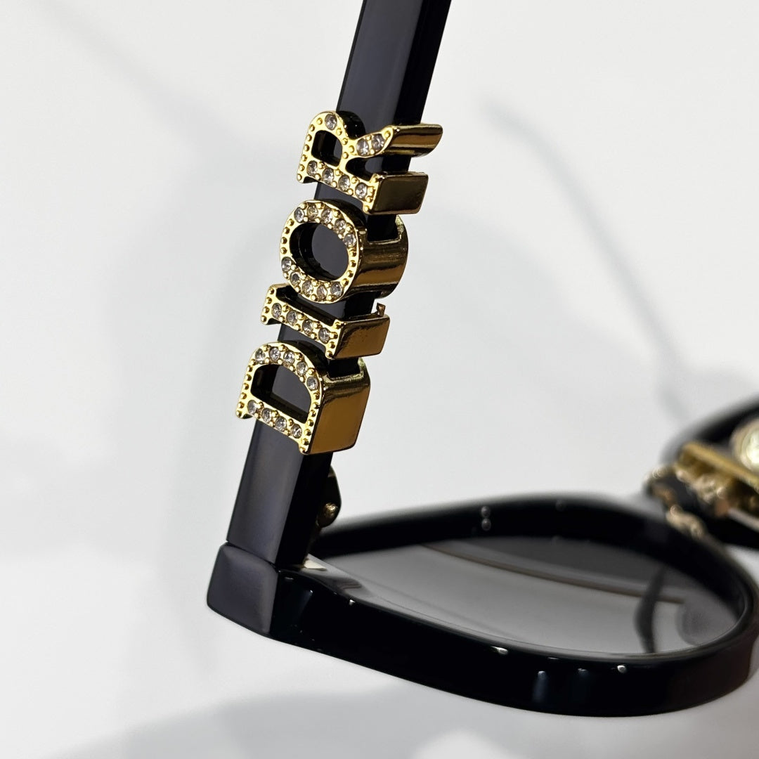 D**R Oval Cat-Eye Sunglasses | Gloss Black Acetate Frame, 3D DIOR Letter Hinge Block, Gold Metal Nose Bridge, Flat Grey Lenses