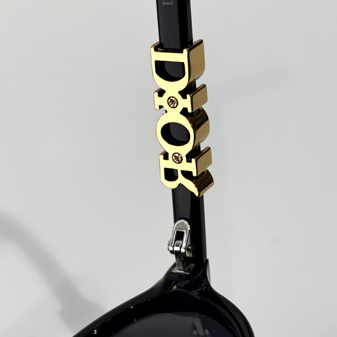 D**R Small Round Oval Sunglasses | Gloss Black Acetate, Crystal-Set DIOR Letter Temple Block, Gold Metal Nose Bridge, Flat Dark Grey Lenses