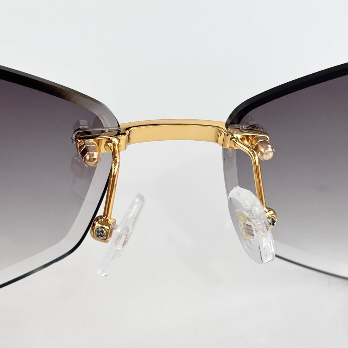 D**R 30Montaigne S6U Rimless Sunglasses | Gold Metal Frame, Brown Gradient Bevelled Lenses, CD Logo Temple | Multiple Colors